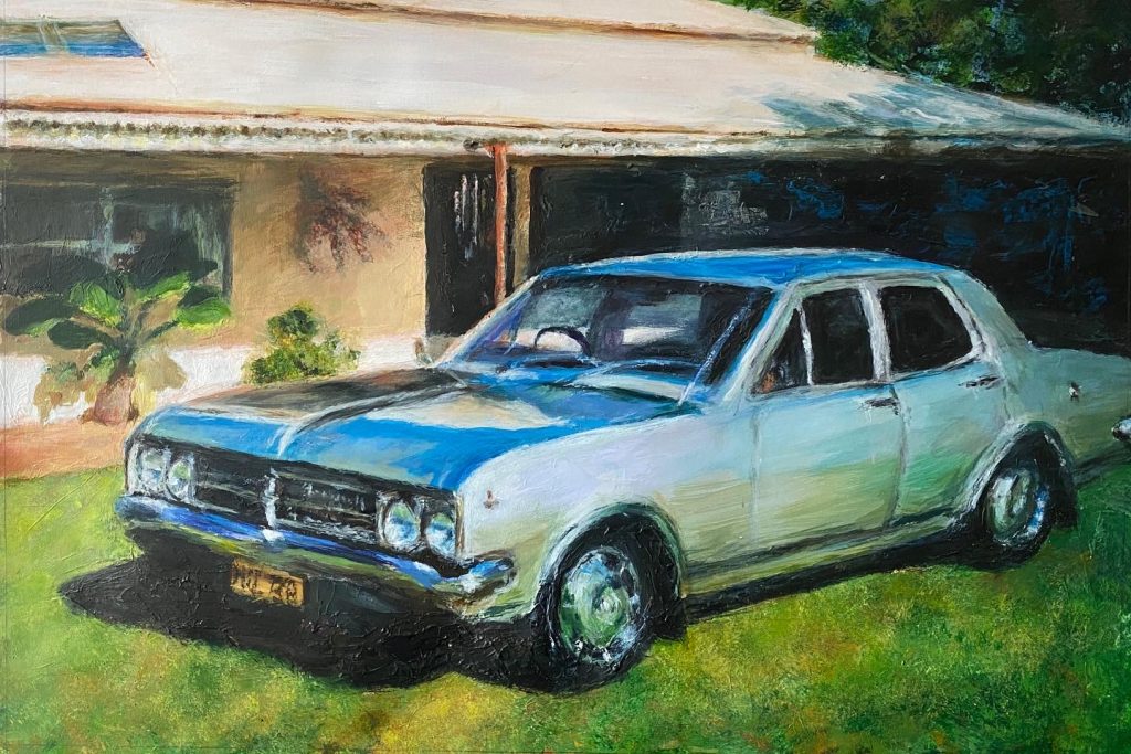 Acrylic painting of a vintage Holden car parked in front of a classic suburban home, highlighting its blue and white exterior. Artwork by Angela Moffat, an Edinburgh-based artist in Scotland.