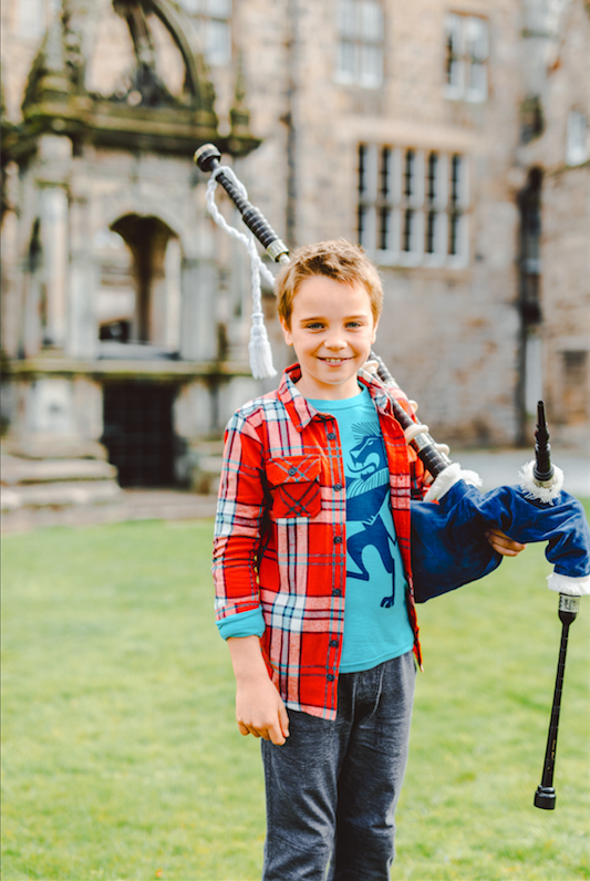 tea-clothing-boy-bagpipes-scottish-castle-filming-scotland-angela-moffat-stylist-edinburgh-scotland-uk